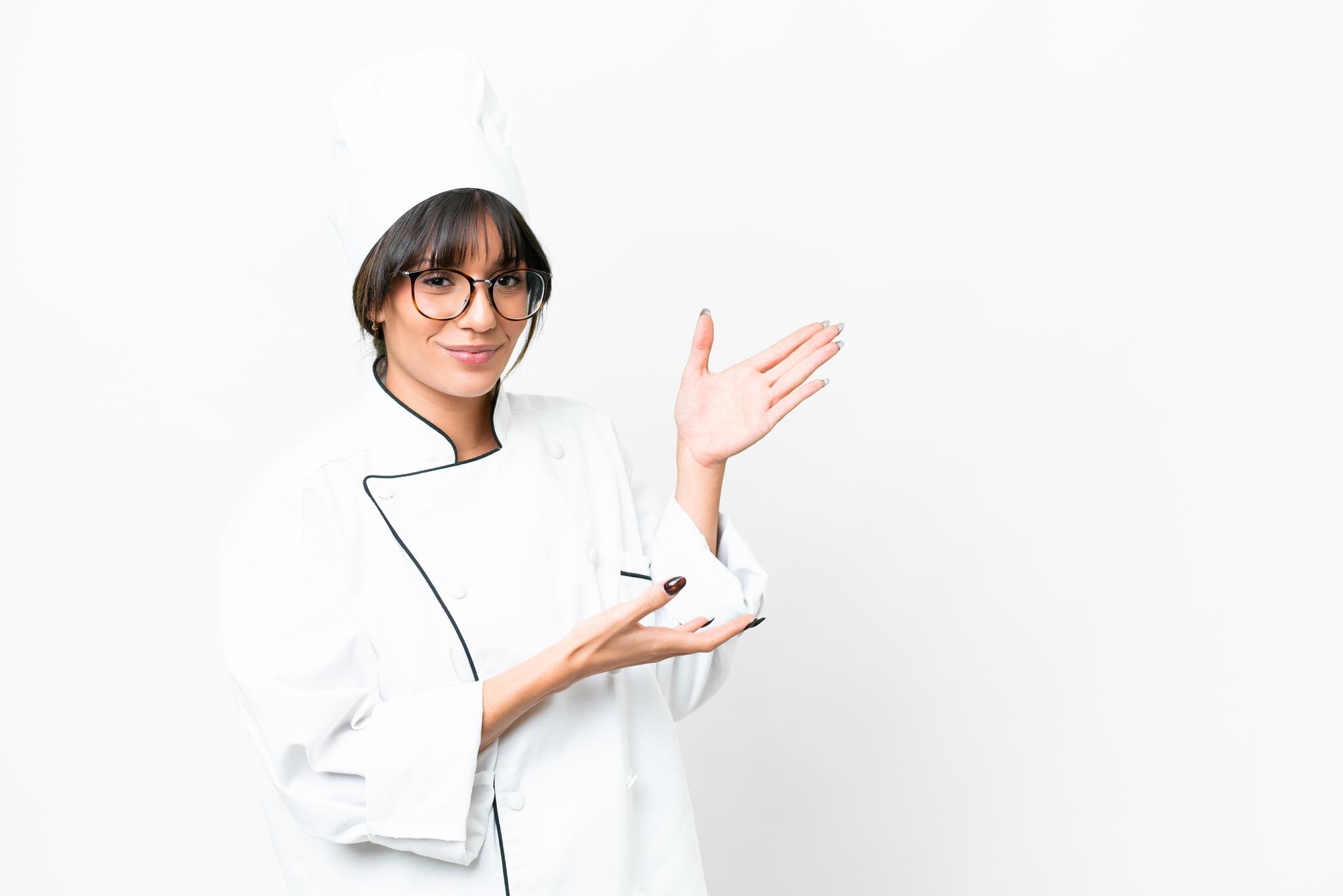 Instructor greeting participants in a kitchen