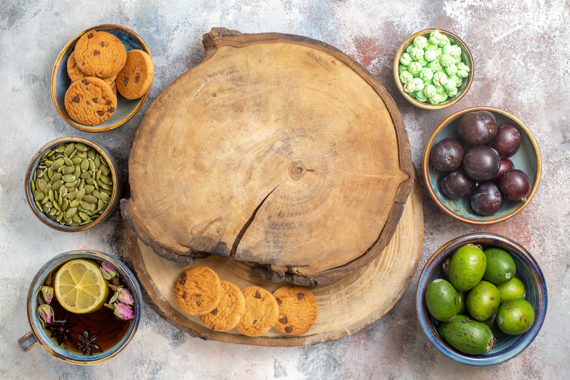 Selection of plated dishes on wooden board